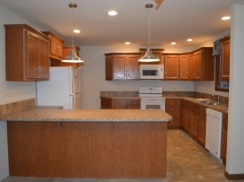 kitchen with wood cabinet photo