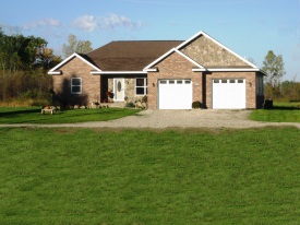 finish brick siding with two car garage house photo